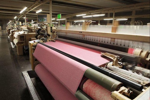 Growing demand from domestic foreign players boosts Indias textile machinery business