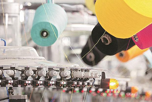 Economic slowdown low investments affect Indias textile machinery exports