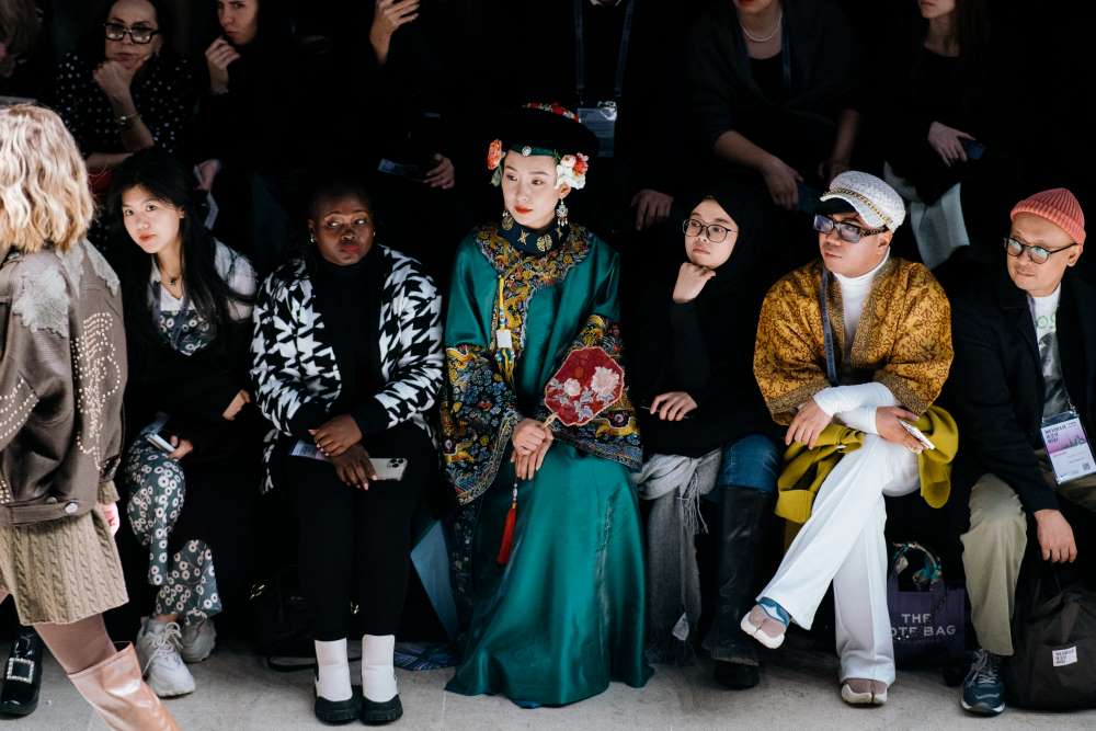 Lily Ji at JULIA DALAKIAN fashion show at Moscow Fashion Week in the vintage 500 year old Ming dynasty dress