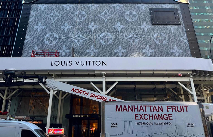 Louis Vuitton unveils giant trunk facade on Fifth Avenue to mask new flagship construction